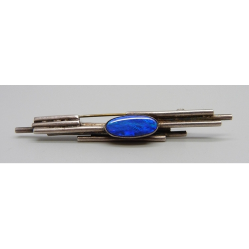 984 - A Modernist white metal and opal set bar brooch, 7cm