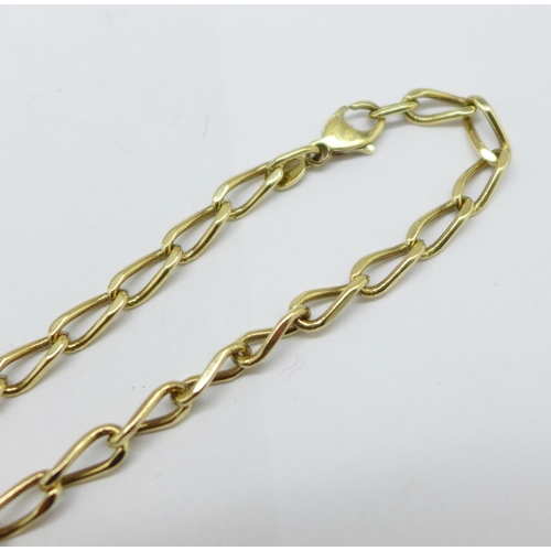 988 - A yellow metal chain, marked 585, 19.3g, 50cm