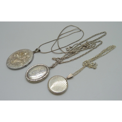 990 - Three silver lockets and chains