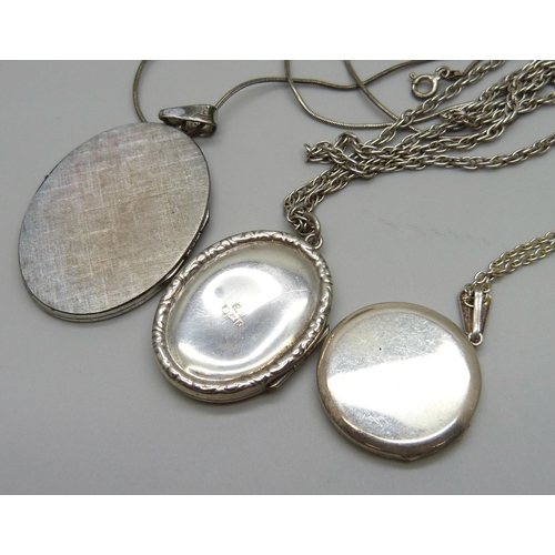 990 - Three silver lockets and chains