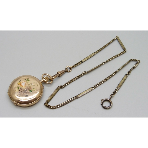 992 - A 14ct gold and enamel fob watch set with one small diamond and with a fancy link chain, enamel a/f,... 