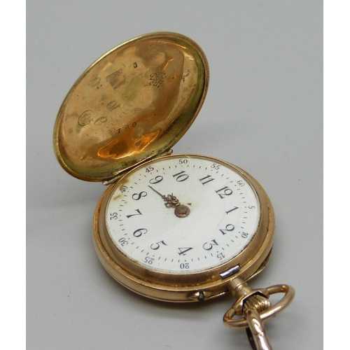 992 - A 14ct gold and enamel fob watch set with one small diamond and with a fancy link chain, enamel a/f,... 