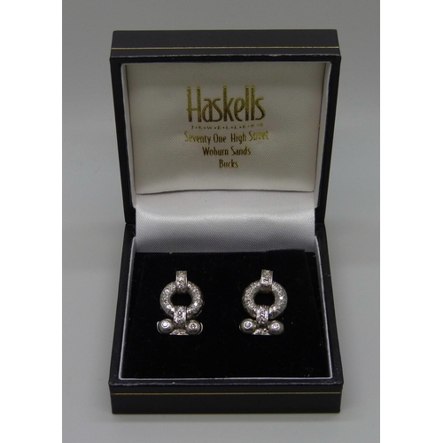 997 - A pair of Art Deco white metal and diamond set earrings, the butterflies marked 750, 8.9g