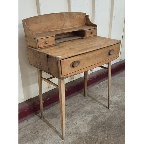 17 - An Ercol Blonde elm 439 model Windsor desk