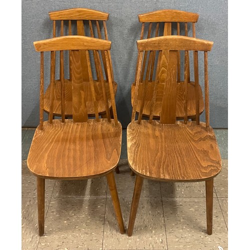 91 - A set of four Scandinavian beech kitchen chairs