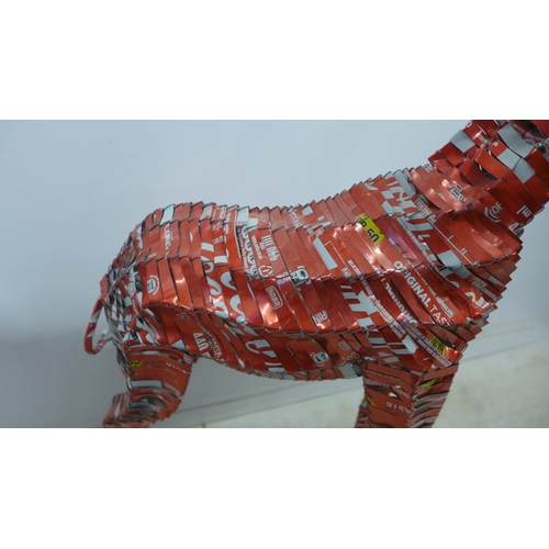 2064 - A decorative giraffe ornament made from shredded Coca Cola cans