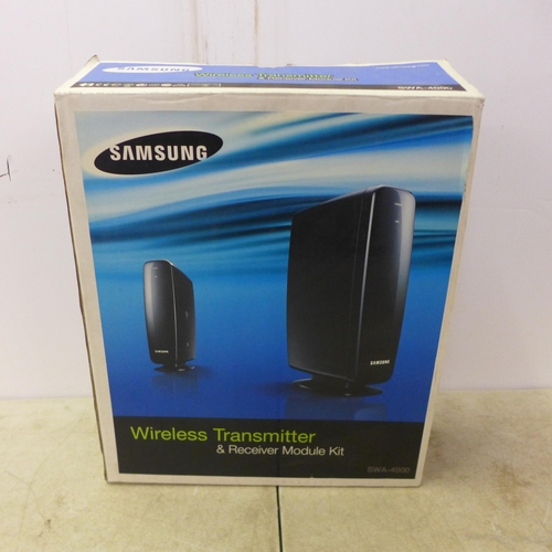 2079 - A Samsung PS-WBD1200 sub woofer, 2 front surround sound speakers and 2 rear surround sound speakers ... 