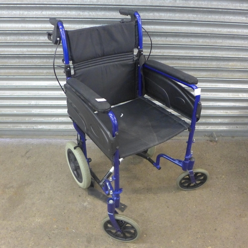 2080 - A Invacare small wheel operator driven folding wheelchair