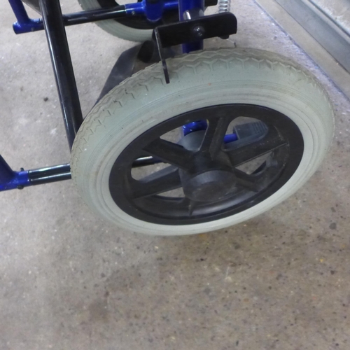 2080 - A Invacare small wheel operator driven folding wheelchair