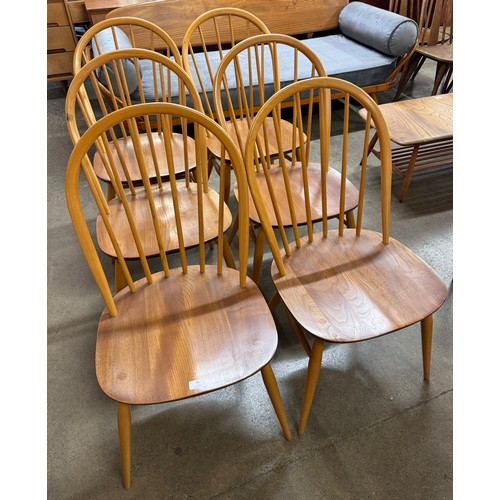 22 - A set of six Ercol Blonde elm and beech Windsor chairs