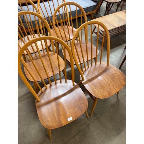 22 - A set of six Ercol Blonde elm and beech Windsor chairs