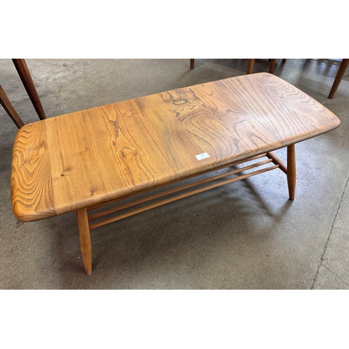 26 - An Ercol Blonde elm and beech Windsor coffee table