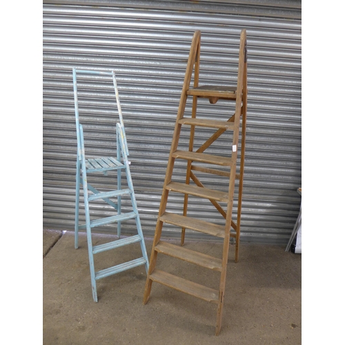 2117 - 2 wooden step ladders - one 5 rung and one 7 rung