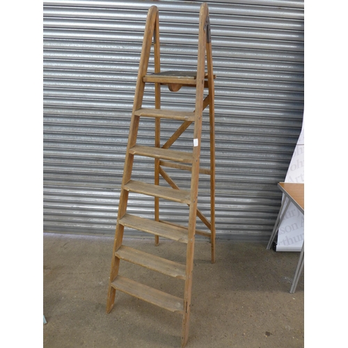 2117 - 2 wooden step ladders - one 5 rung and one 7 rung