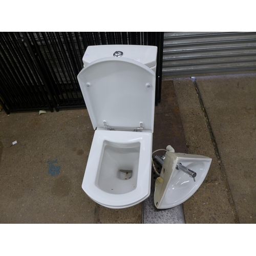 2149 - A contemporary designed toilet and hand wash basin