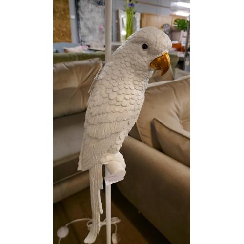 1341 - A white floor standing parrot lamp