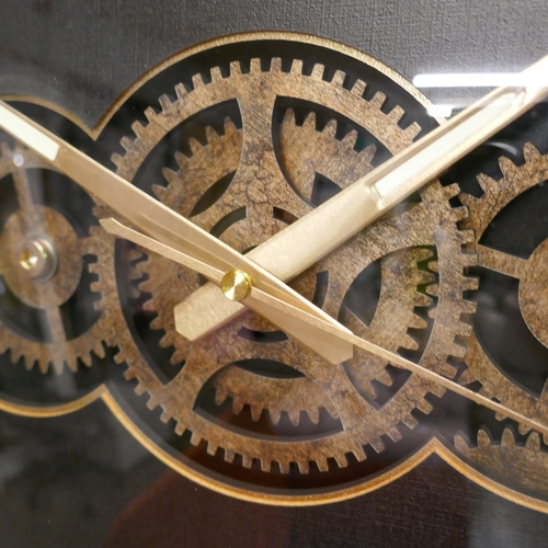 1373 - A moving gears wall clock