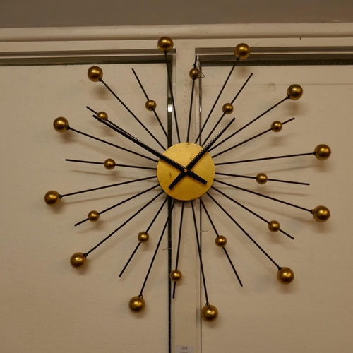 1374 - A Sputnik style wall clock