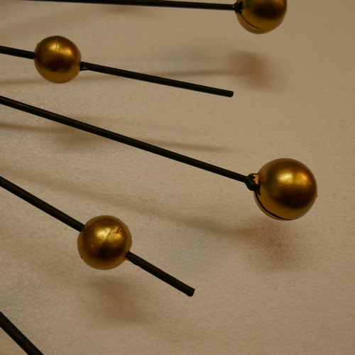 1374 - A Sputnik style wall clock