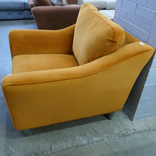 1441 - A tangerine velvet armchair - brand new