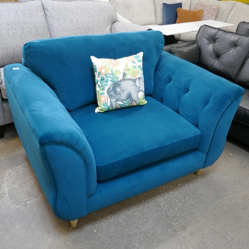 1453 - A turquoise velvet love seat - manufacturer's return