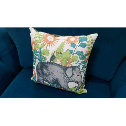 1453 - A turquoise velvet love seat - manufacturer's return