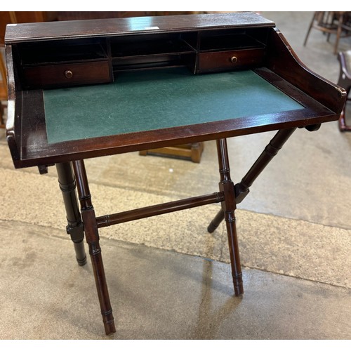 168 - A Victorian style mahogany folding desk