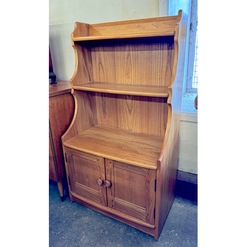 32 - An Ercol Blonde ash open bookcase