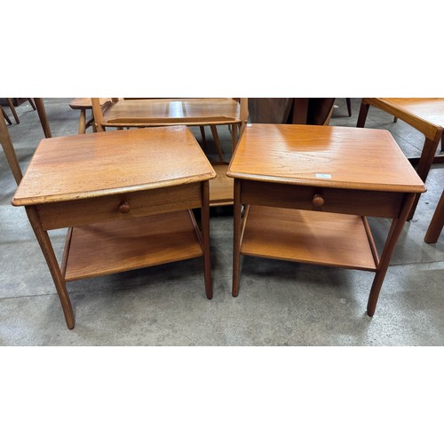 40 - A pair of teak single drawer bedside tables