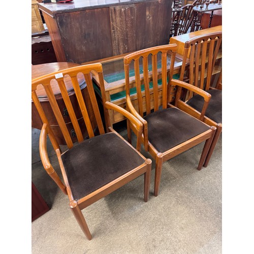 42 - A set of four Meredew teak dining chairs