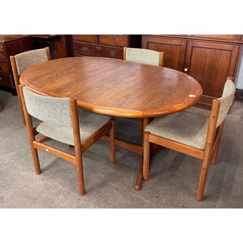 51 - A Danish teak extending dining table and four chairs