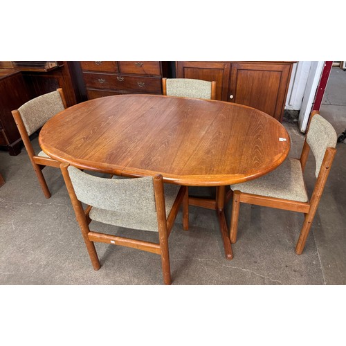 51 - A Danish teak extending dining table and four chairs