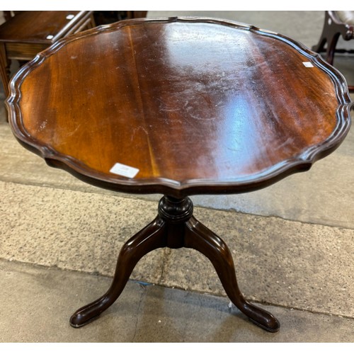 202 - A Chippendale Revival mahogany pie crust tripod occasional table