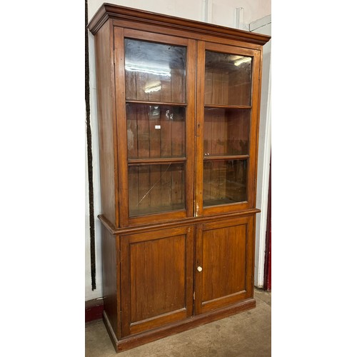 123 - A Victorian pitch pine four door housekeepers cupboard