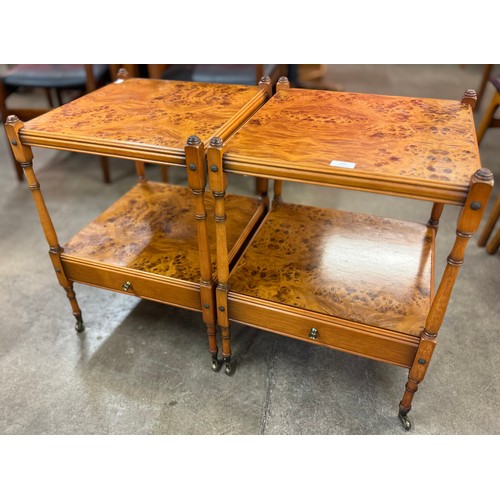 135 - A pair of Regency style burr yew wood lamp tables