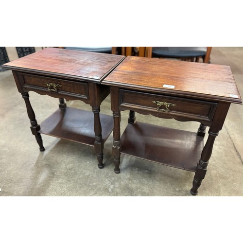 136 - A pair of George III style mahogany single drawer lamp tables