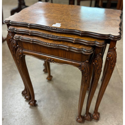 137 - A Queen Anne style burr walnut nest of tables