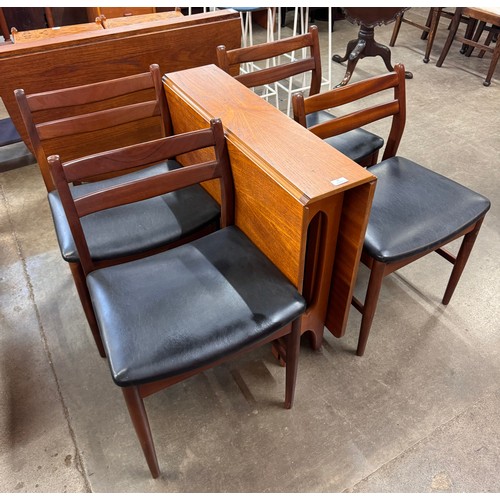 54 - A Jentique teak 507 model table and a set of four 38 model chairs