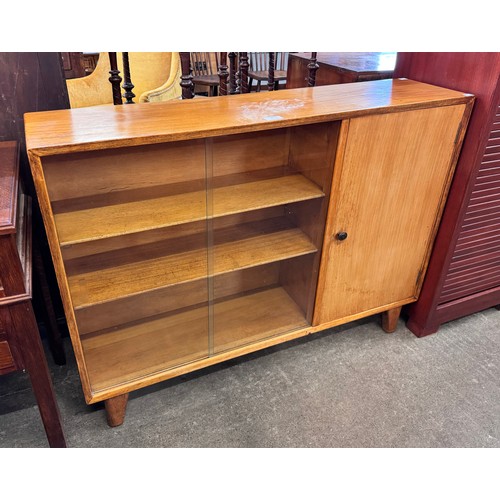 62 - An Alfred Cox teak bookcase