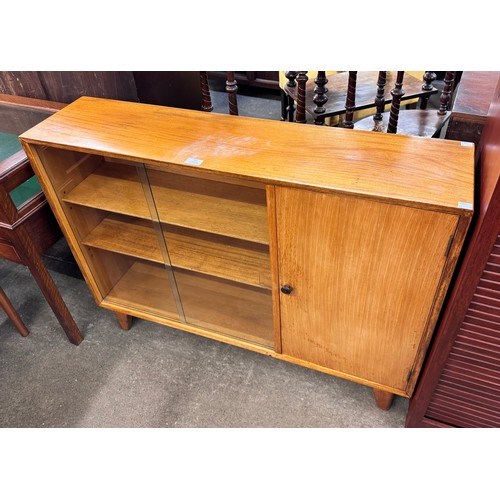 62 - An Alfred Cox teak bookcase