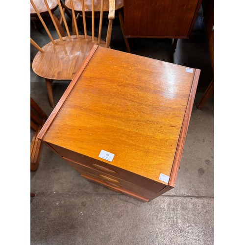 66 - A small teak chest of drawers