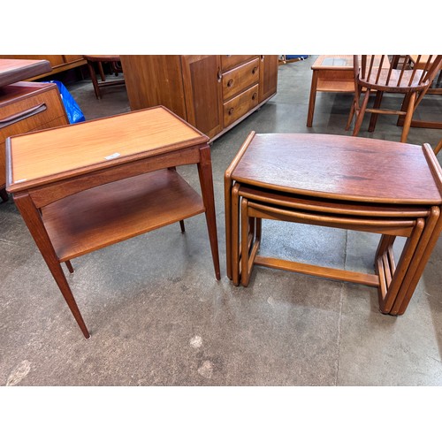 68 - A Danish teak two tier occasional table and a teak nest of tables