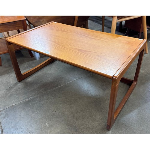 70 - A teak coffee table