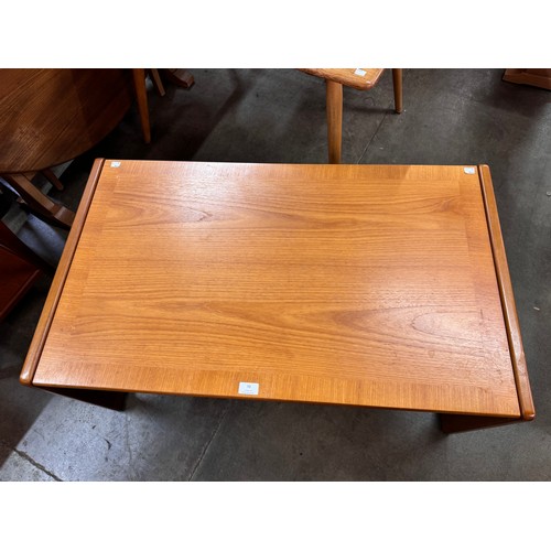 70 - A teak coffee table