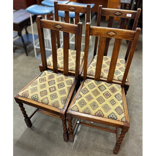 139 - A set of four early 20th Century oak barleytwist dining chairs