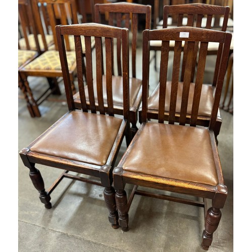 140 - A set of four early 20th Century oak dining chairs