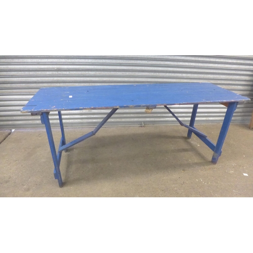 2099 - A pair of 6ft blue painted wooden trestle tables