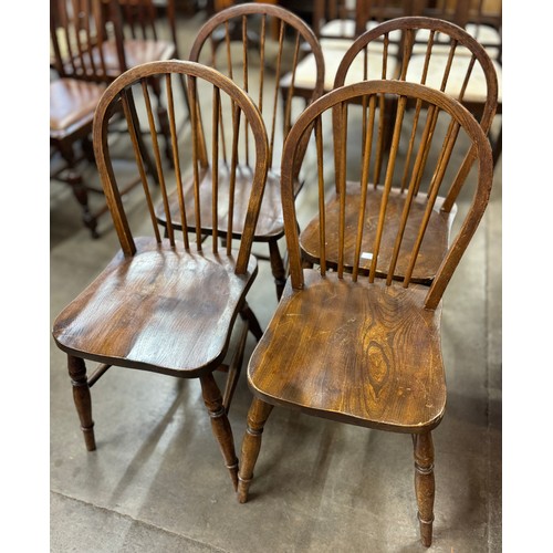 142 - A set of four elm and beech kitchen chairs