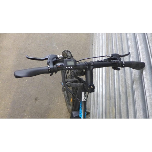 2131 - A Huffy Transic+ 26 front suspension lithium powered electric assist bike with key, battery and char... 