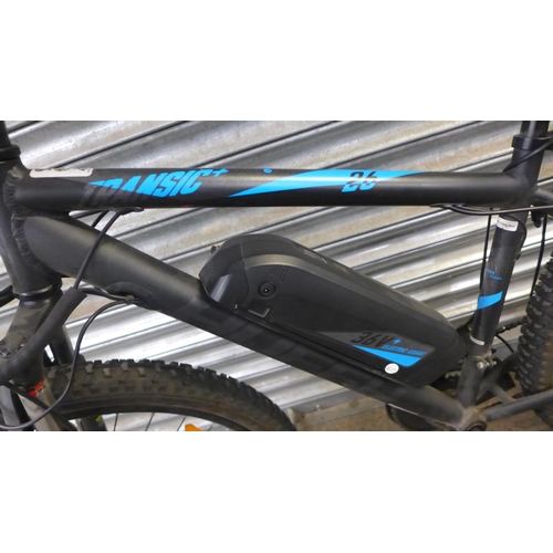 2131 - A Huffy Transic+ 26 front suspension lithium powered electric assist bike with key, battery and char... 